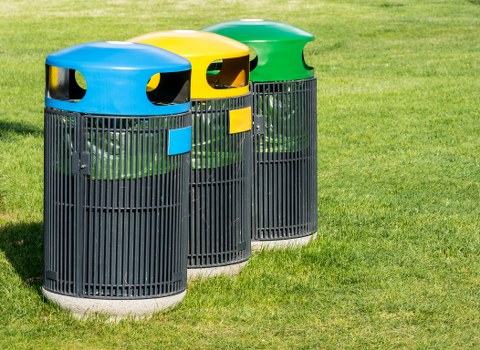 Different sizes of skips placed on a street