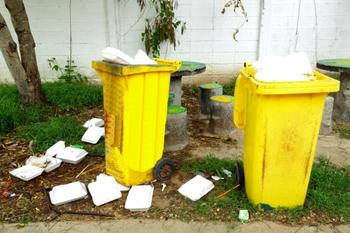 Professional team handling household waste in Southgate