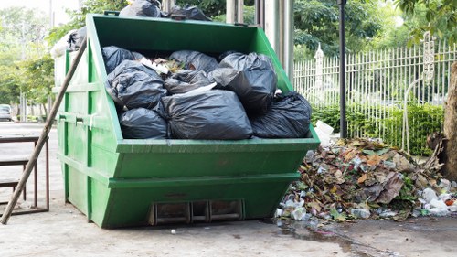 Family using a skip for home renovation waste