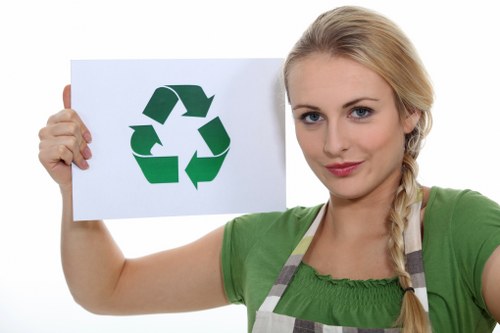 Professional staff assisting a customer with grab hire services